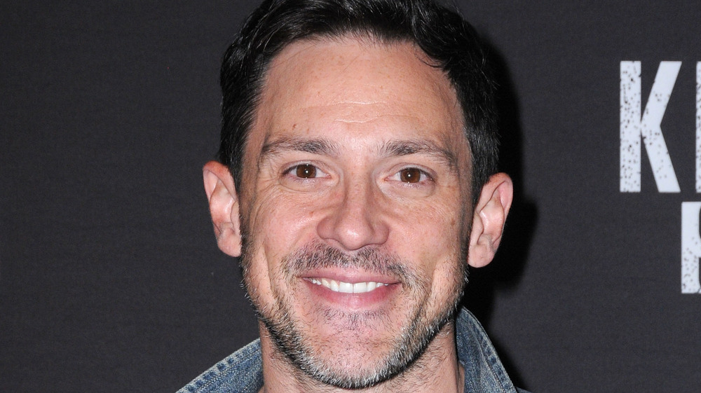 Steve Kazee smiling looking into the camera