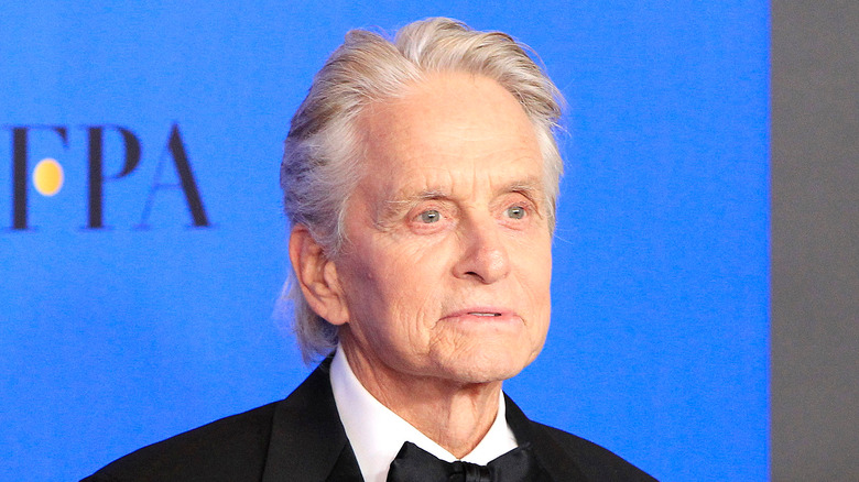 Michael Douglas slightly smiling