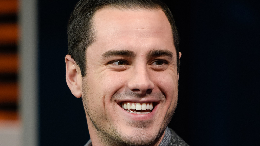 Ben Higgins smiling at an event