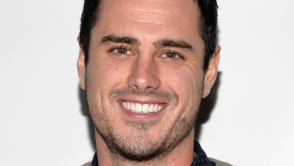 Ben Higgins posing on the red carpet