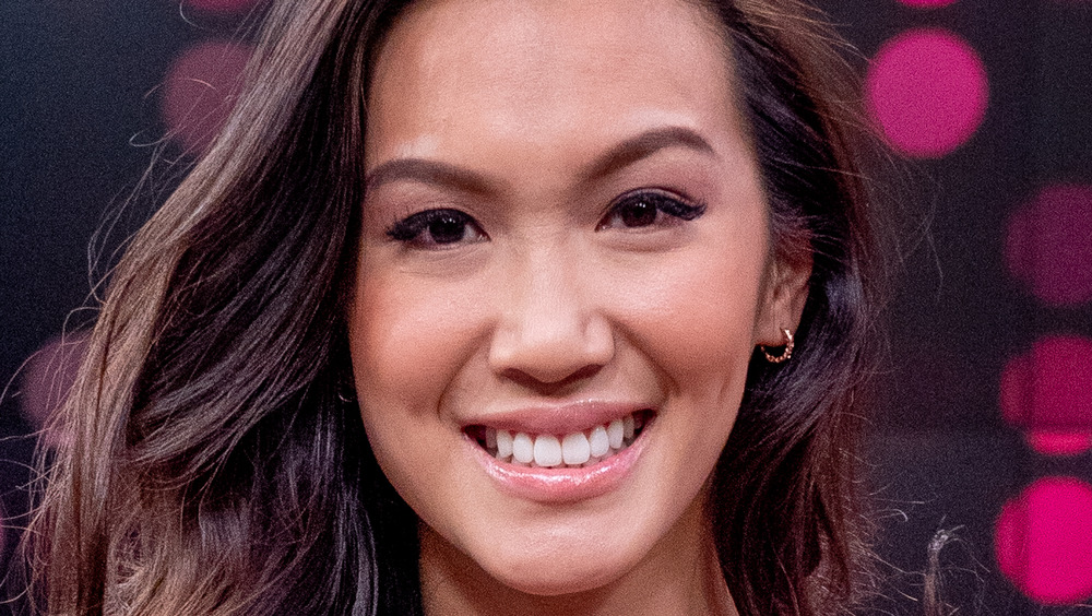 Tammy Ly smiling on a talk show