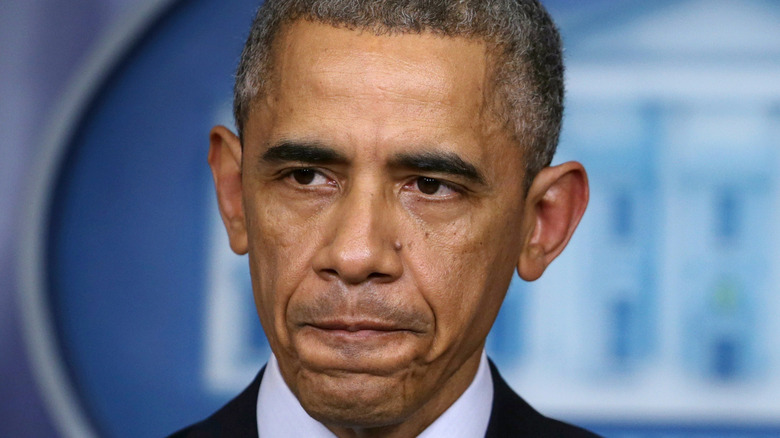 Barack Obama gray hair glum close-up