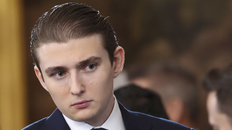 Barron Trump with slicked-back hair