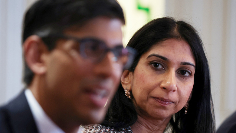 Suella Braverman Rishi Sunak staring