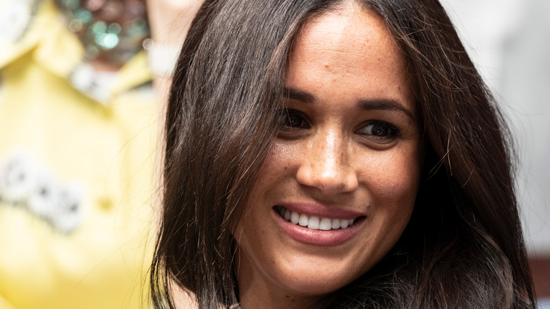 Duchess of Sussex Meghan Markle smiles at the US Open Championships