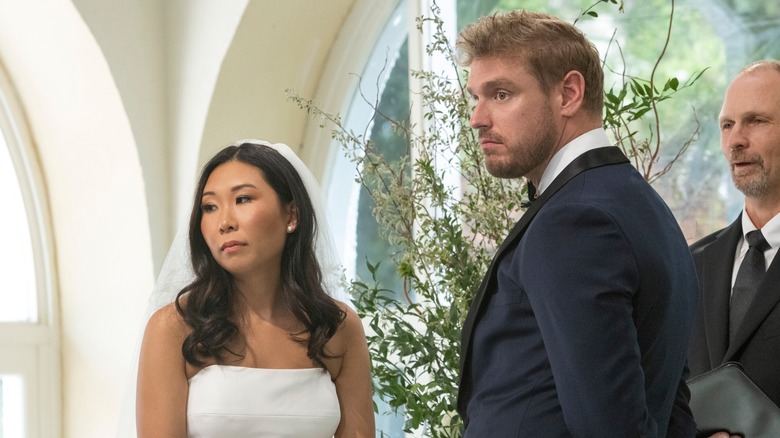 Natalie and Shayne looking sad at wedding on "Love is Blind"