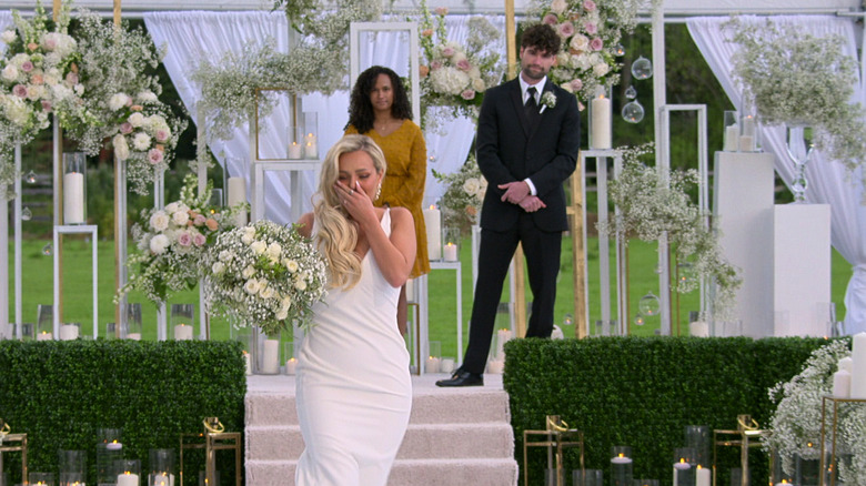 Micah walking away from Paul at the altar on "Love is Blind"
