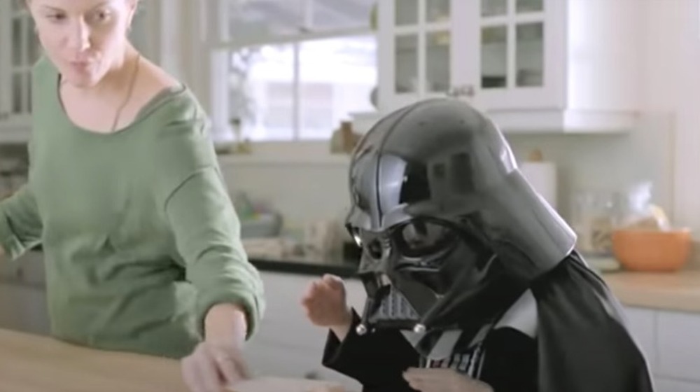 Little boy in a Darth Vader costume
