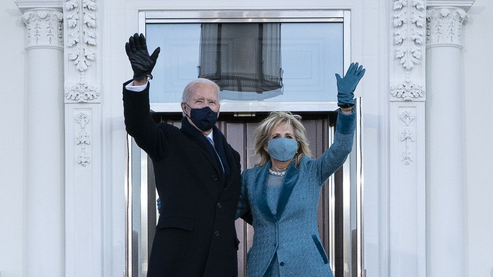 Joe Biden and Jill Biden waving