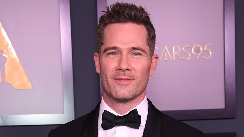 Luke Macfarlane posing on the red carpet