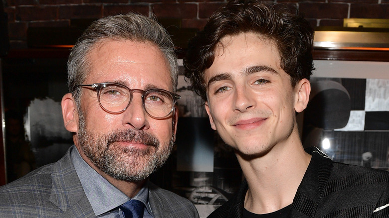Steve Carell and Timothee Chalamet smile for photo