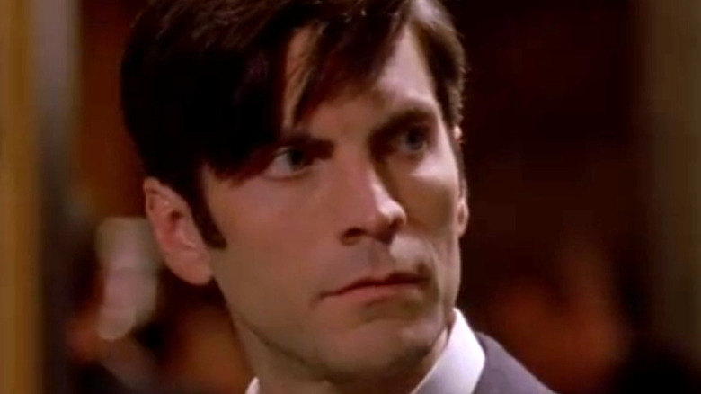 Wes Bentley staring to the left on AHS
