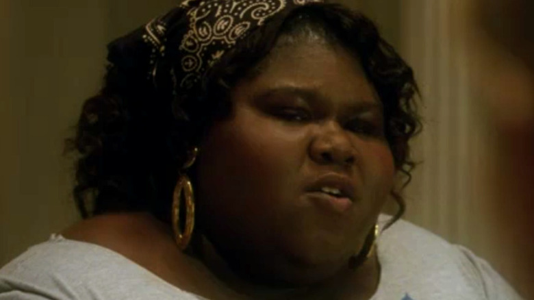 Gabourey Sidibe wearing headscarf as Queenie