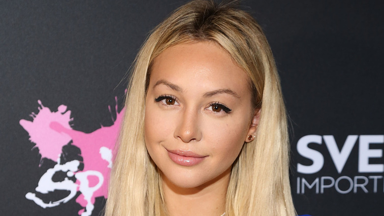Corinne Olympios smirking