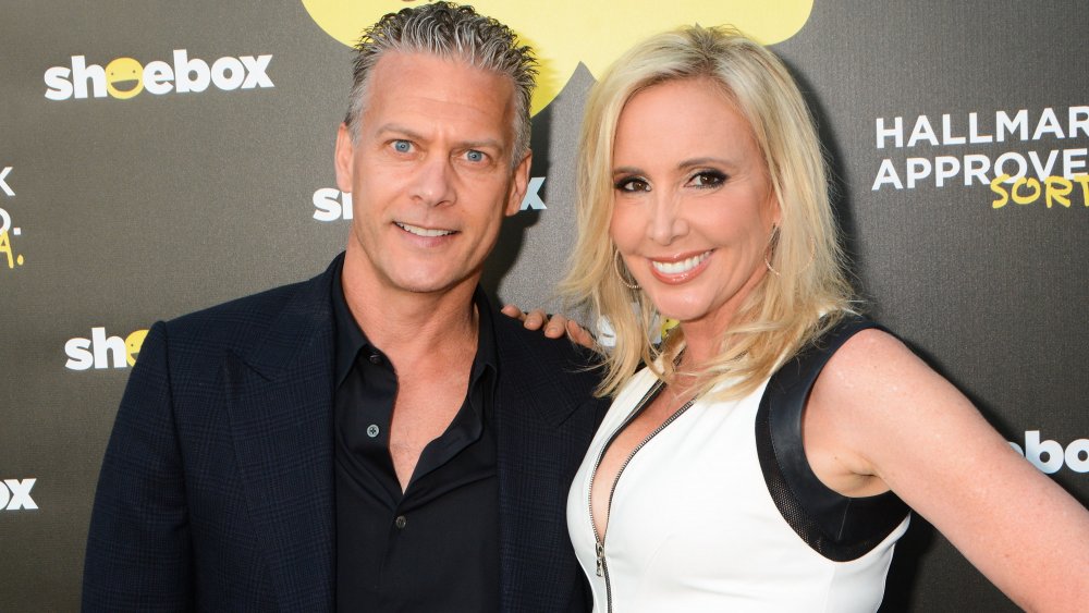 David Beador and Shannon Beador arm in arm posing