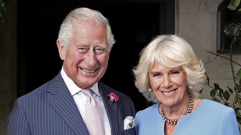 Camilla Parker Bowles and King Charles smiling.