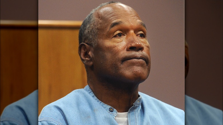 OJ Simpson with lips pressed together