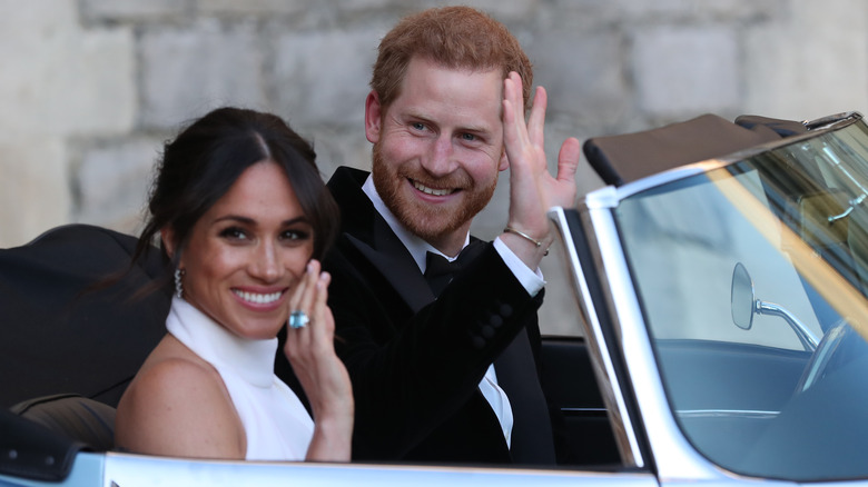Meghan Markle and Prince Harry waving