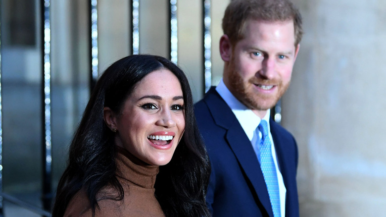 Meghan Markle and Prince Harry smiling