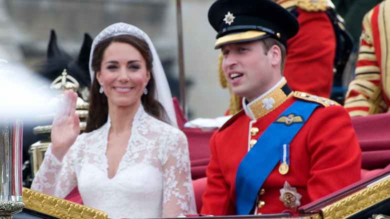 Kate Middleton and Prince William waving after wedding