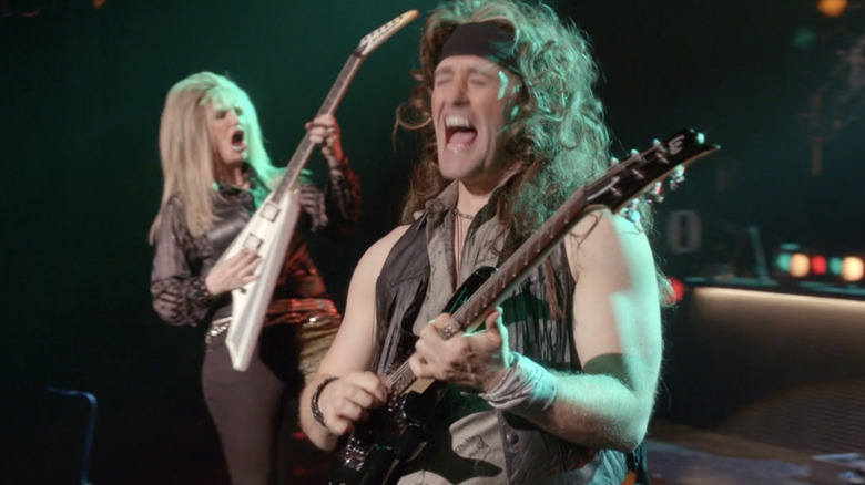 Will and Sue rock out on "Glee"