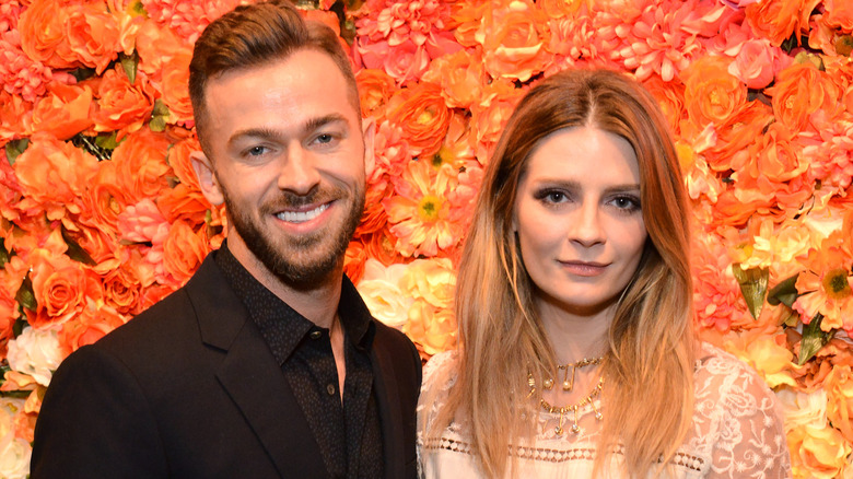 Artem Chigvintsev and Mischa Barton posing