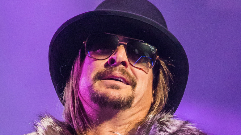 Kid Rock onstage performing