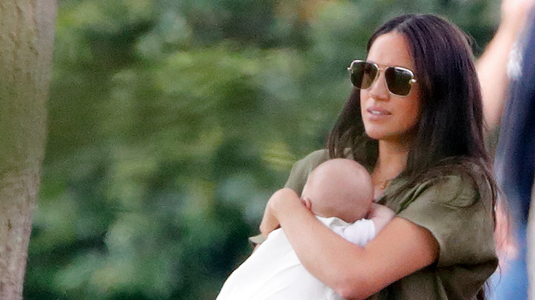 Meghan Markle holds Archie