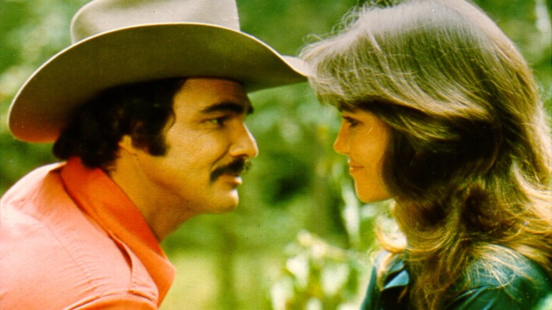 Burt Reynolds and Sally Field smiling 