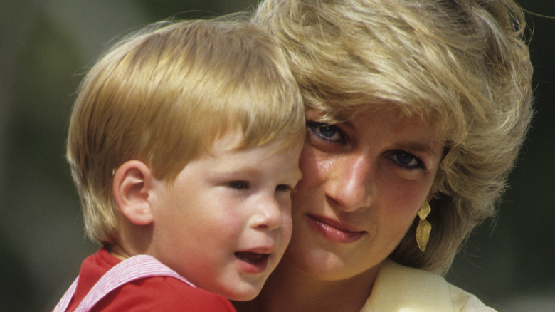 Princess Diana and Prince Harry at an event 