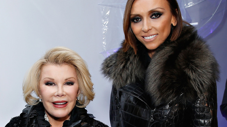 Giuliana Rancic posing with Joan Rivers at a 2014 event