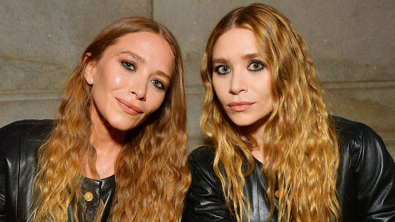 Ashley Olsen Mary-Kate Olsen posing