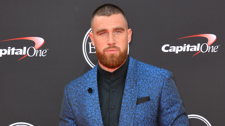 Travis Kelce wearing blue blazer