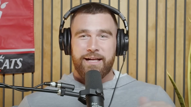 Travis Kelce speaking into microphone