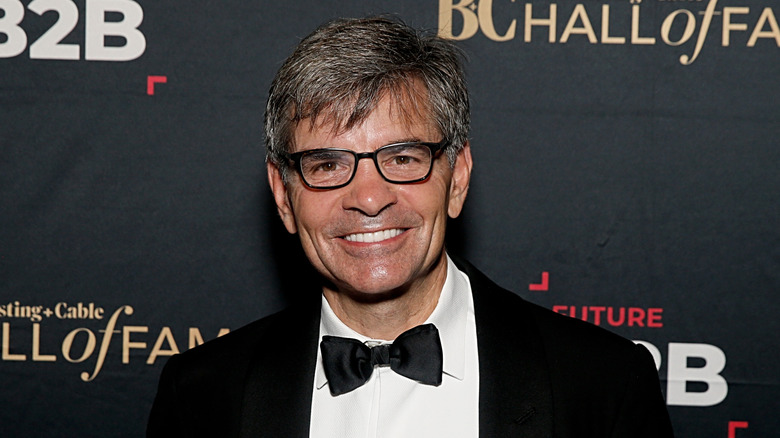George Stephanopoulos poses in a tux in 2024