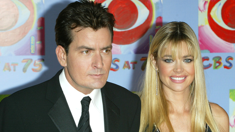 Charlie Sheen and Denise Richards posing