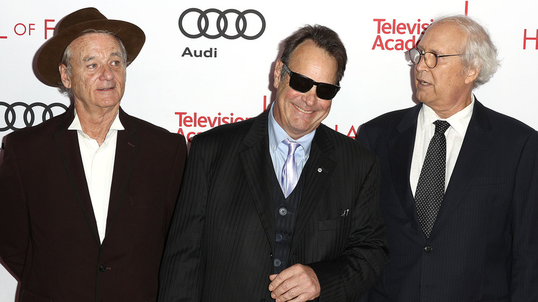 Bill Murray, Dan Ackroyd, and Chevy Chase on red carpet