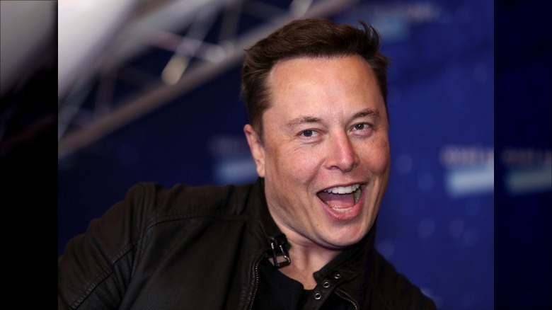 Elon Musk laughing