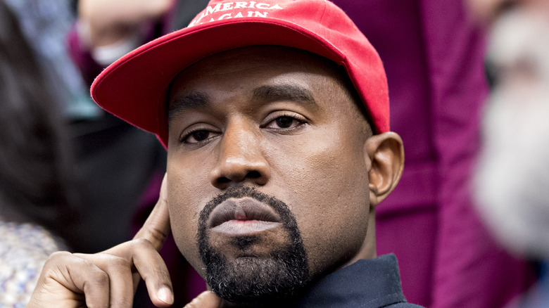 Kanye West wearing MAGA hat