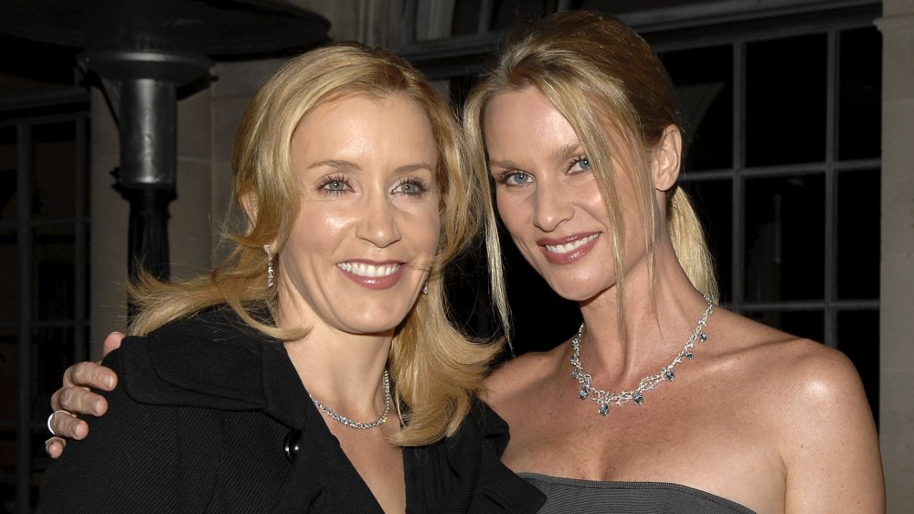 Felicity Huffman and Nicollette Sheridan in an embrace