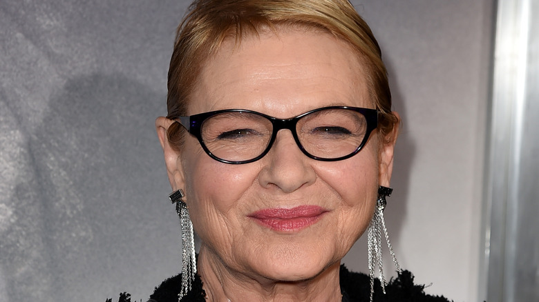 Dianne Wiest smiling in glasses