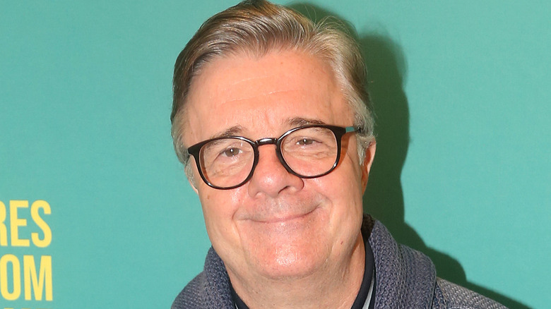Nathan Lane smiling at event