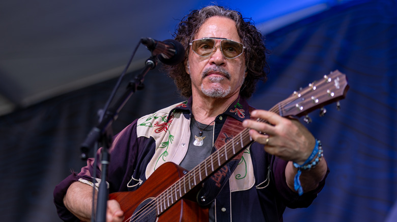 John Oates on stage guitar