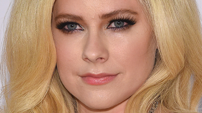 Avril Lavigne gazing in front