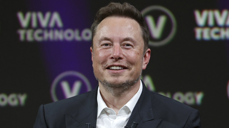 Elon Musk smiling