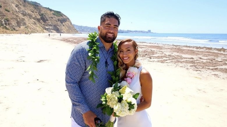 Manti Te'o and Jovi Nicole Engbino smiling
