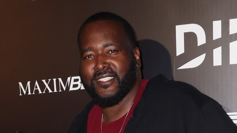 Quinton Aaron poses red carpet 