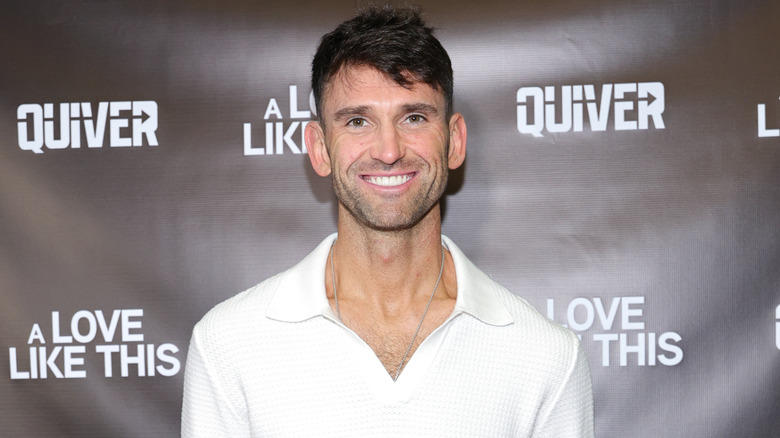 Carl Radke posing on the red carpet.