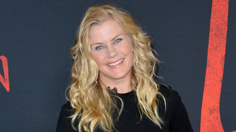 Alison Sweeney on a red carpet, smiling