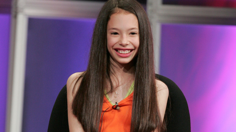 young Chloe Bridges smiling